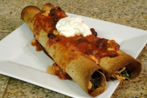 chicken and spinach taquitos topped